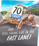 UK Greetings 70th Birthday Card featuring a humorous tortoise design, with an envelope, suitable for her or him.