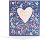 UK Greetings birthday card for niece featuring a vibrant floral design, with colorful flowers and cheerful birthday message.