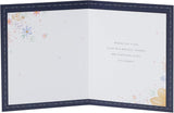 UK Greetings birthday card for sister featuring floral perfume design with colorful floral artwork and elegant lettering.