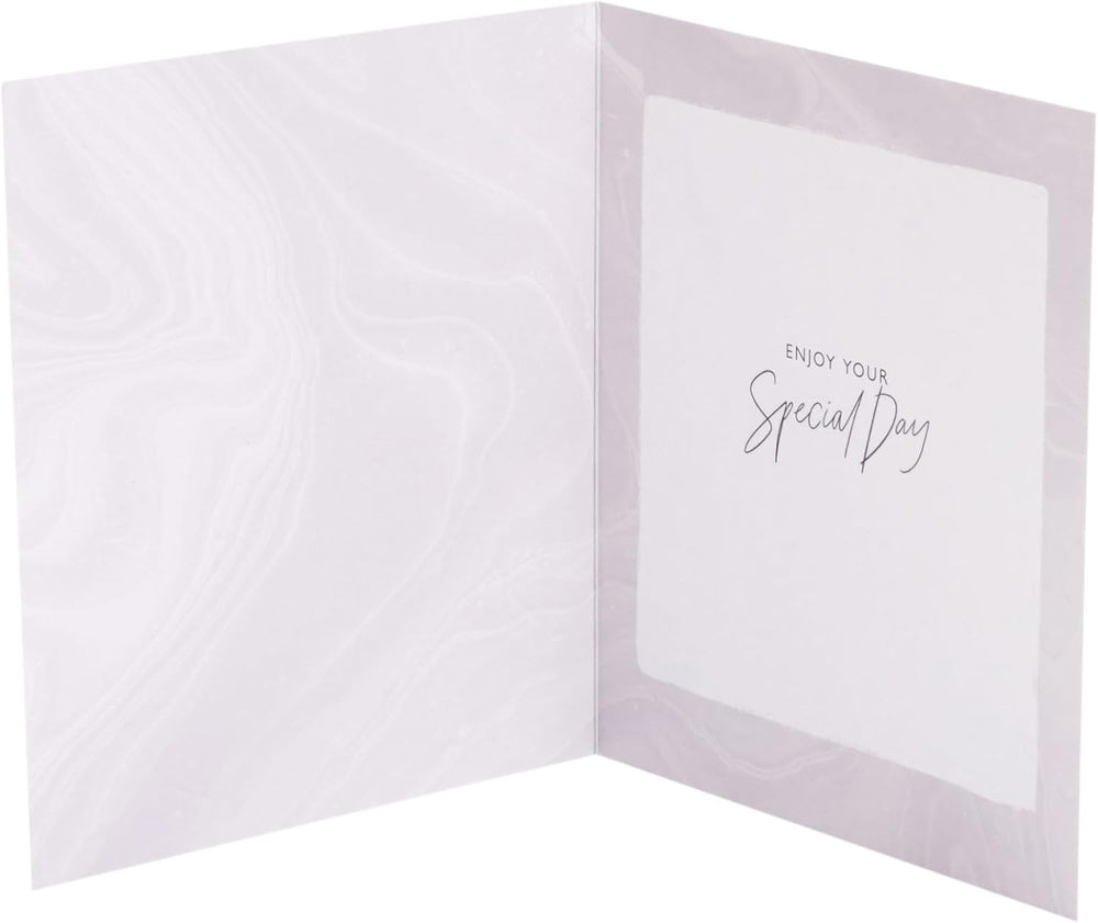 UK Greetings black and gold birthday card with elegant design, featuring festive accents and a stylish appearance.