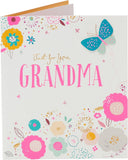UK Greetings birthday card featuring an elegant flower and butterfly design with gold foil and 3D detailing for grandma.