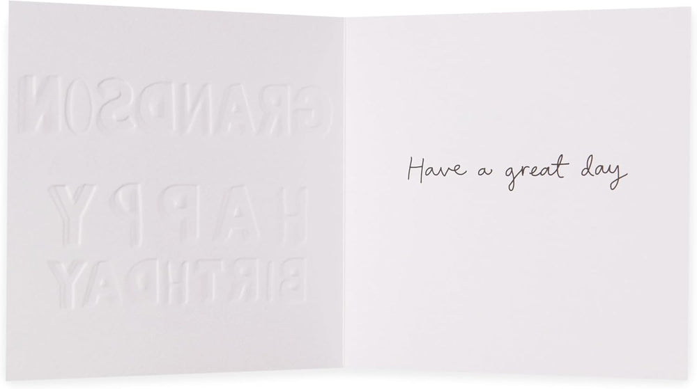 UK Greetings Kindred grandson birthday card featuring colorful design and cheerful message for celebrating a special occasion.