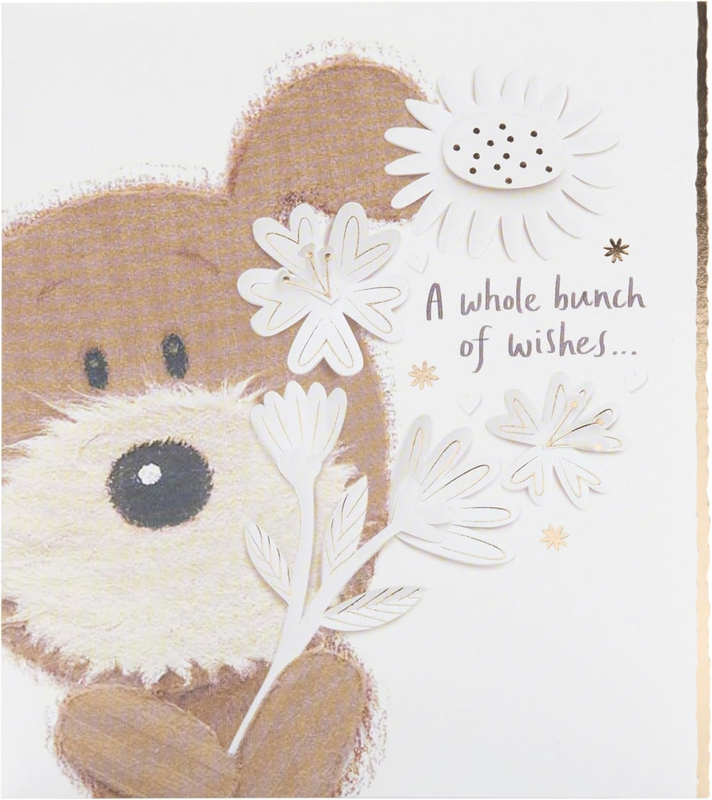 UK Greetings Lots of Woof birthday card featuring a cute, playful dog illustration on a colorful greeting card.