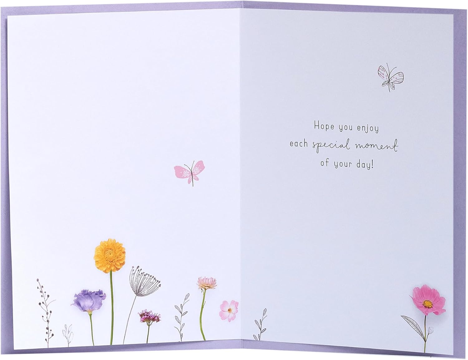 UK Greetings Meadows Birthday Card with elegant nature design, featuring colorful flowers and leaves for all ages.