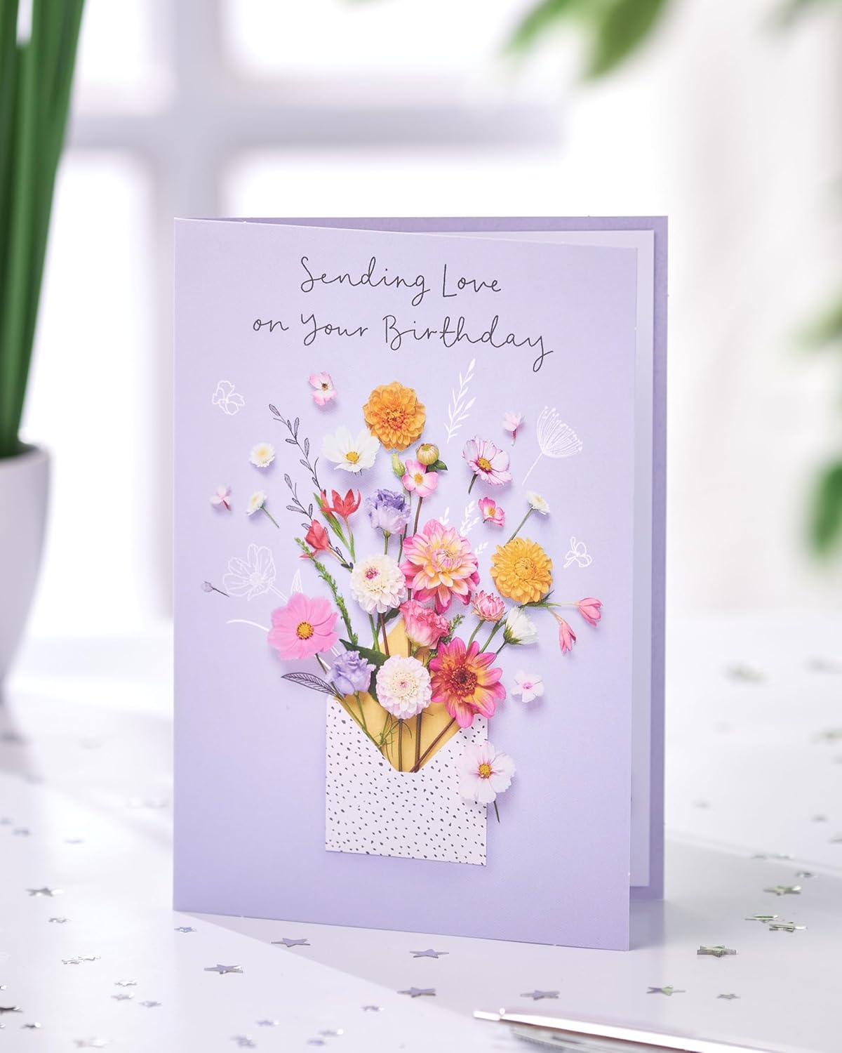 UK Greetings Meadows birthday card featuring elegant nature-inspired design, suitable for all ages, with floral and scenic illustrations.