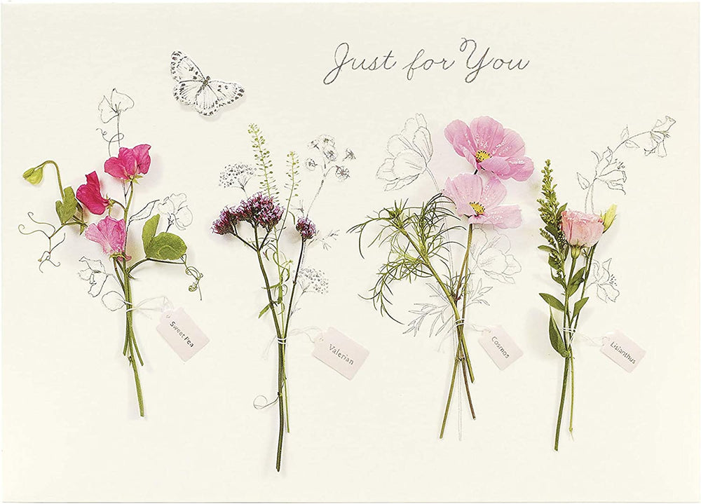 Set of six UK Greetings floral birthday cards featuring pretty, colorful floral designs for celebrating special occasions.
