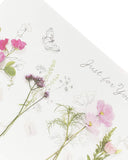 Set of six UK Greetings floral birthday cards featuring pretty floral designs, ideal for celebrating special occasions.