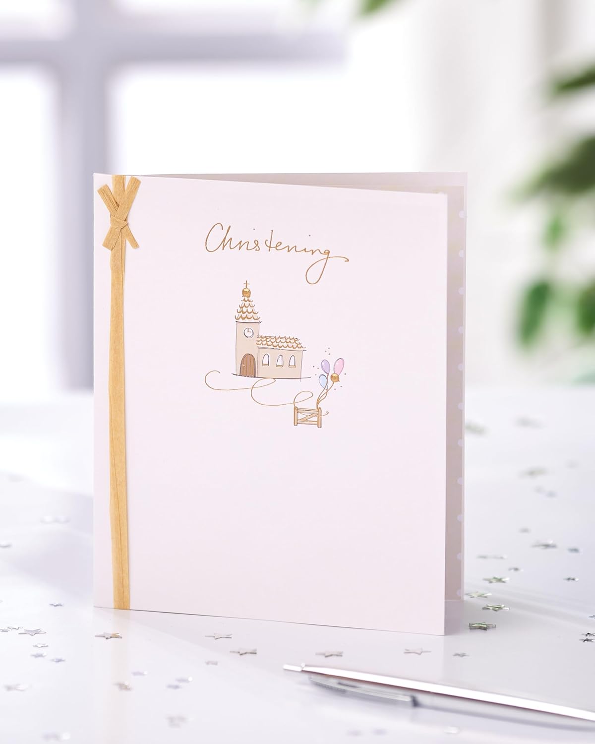 UK Greetings Christening Card featuring a heartfelt design for a baby's special day, perfect for celebrating a christening.