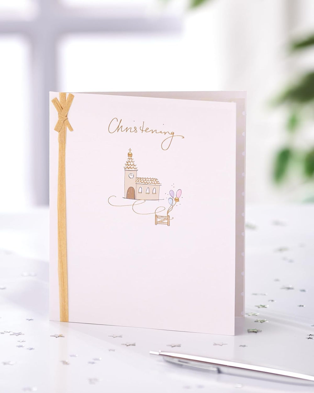 UK Greetings Christening Card featuring a heartfelt design for a baby's special day, perfect for celebrating a christening.