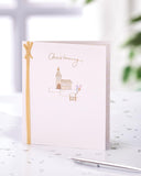 UK Greetings Christening Card featuring a heartfelt design for a baby's special day, perfect for celebrating a christening.