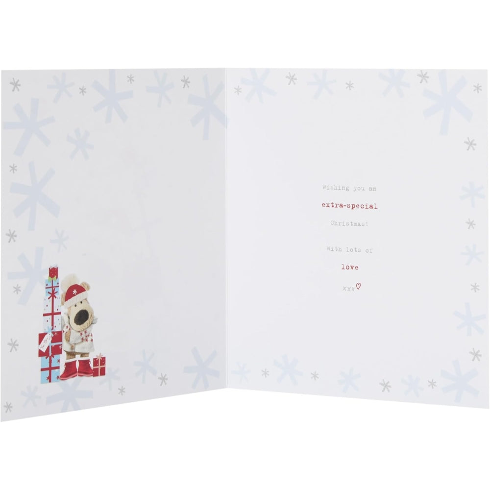 UK Greetings Boofle Christmas card featuring a pile of gifts for granddaughter, festive holiday design.