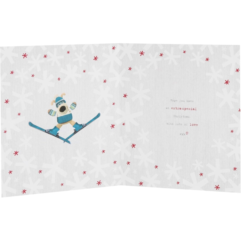 UK Greetings Boofle skiing brother Christmas card featuring festive holiday design with Boofle character on a snowy background.