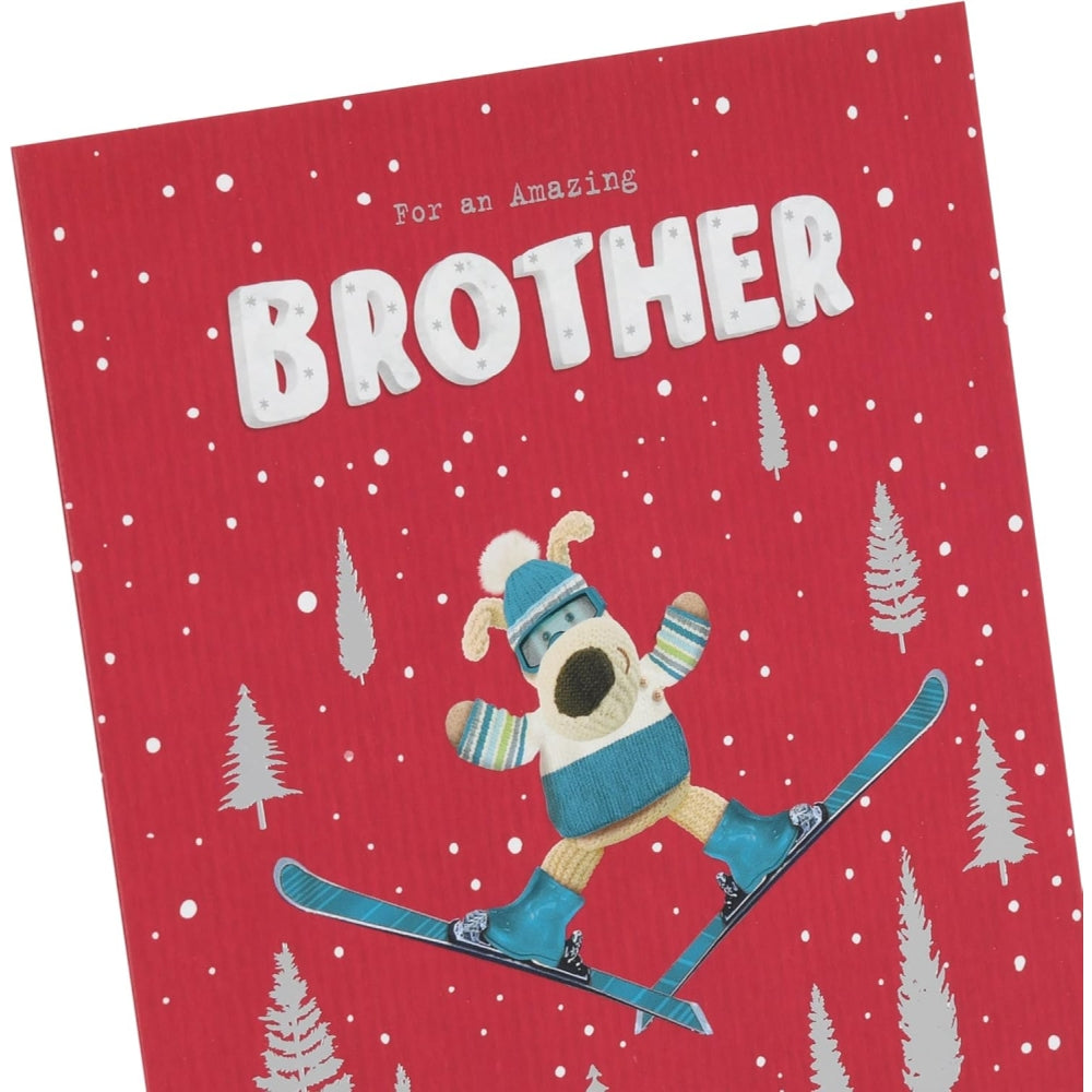 UK Greetings Boofle skiing brother Christmas card featuring festive design with Boofle character wearing ski gear and holiday decorations