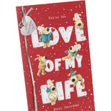 UK Greetings Boofles Christmas Card by Lettering Love of Life, featuring colorful festive cartoon character design.