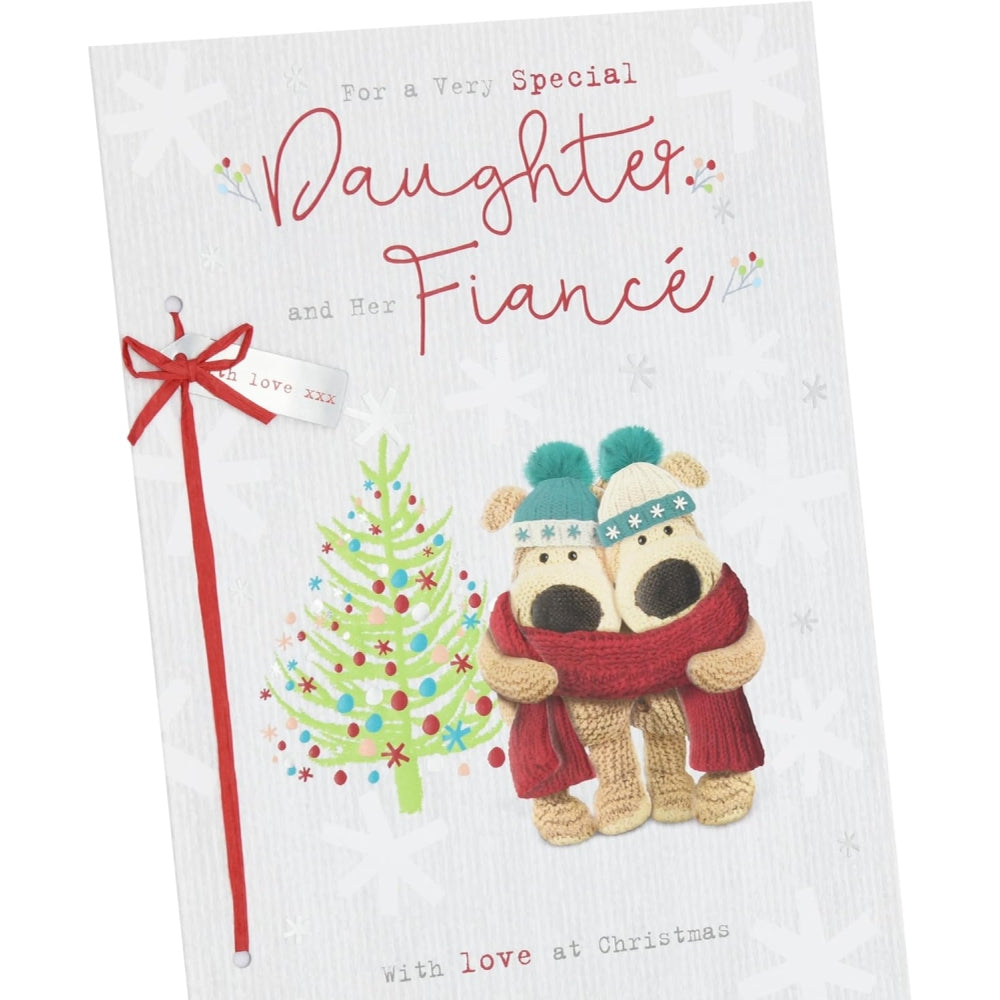 UK Greetings Boofles Christmas card featuring a daughter and fiancé near a Christmas tree, festive holiday greeting card for Christmas.