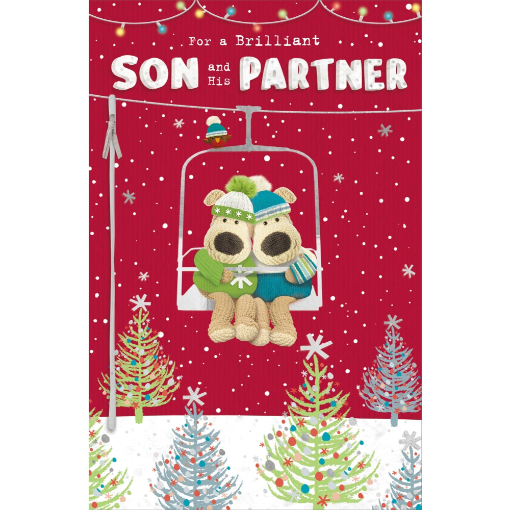 UK Greetings Christmas card featuring Boofles on a gondola ride with his son and partner, festive holiday design.