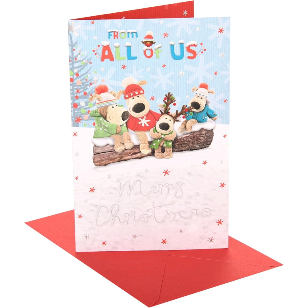 UK Greetings Boofles sitting on a log Christmas card featuring festive holiday scene and colorful holiday illustration.