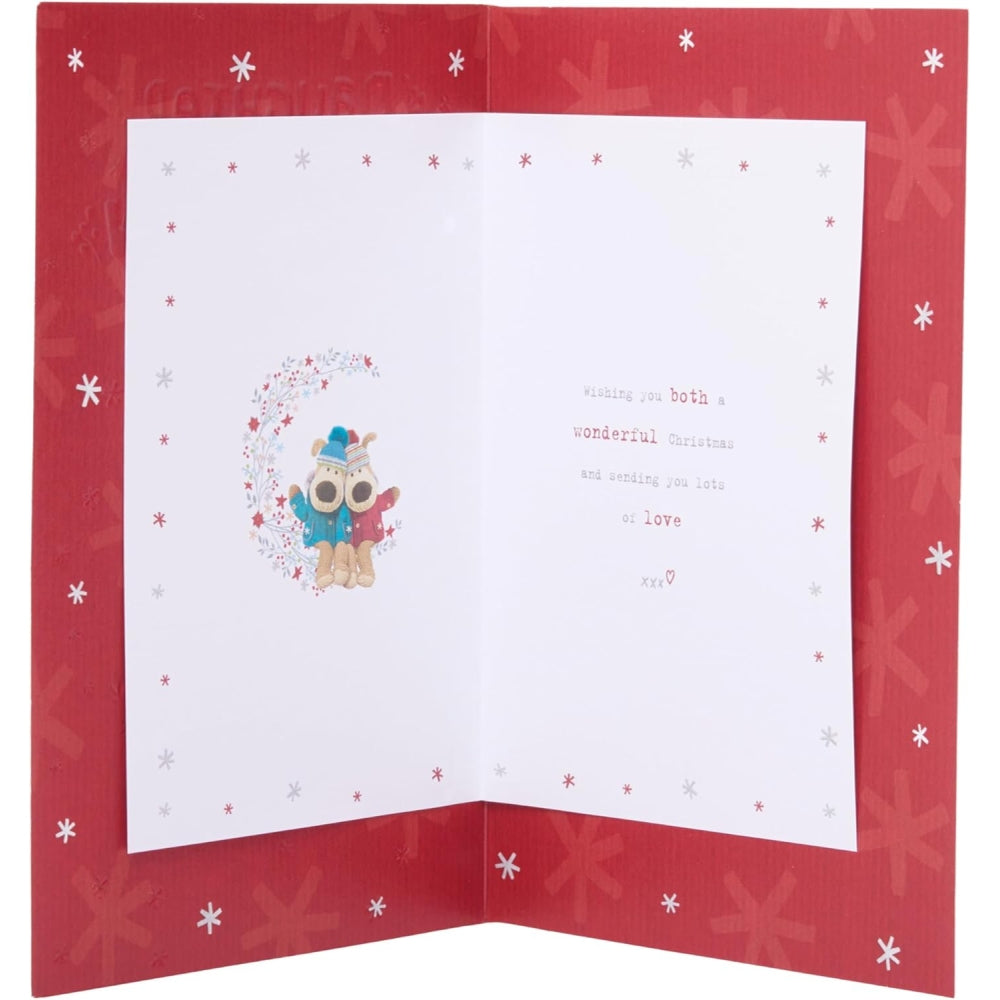 UK Greetings Christmas card featuring Boofles sitting on a wreath, suitable for daughter or son-in-law holiday greetings.
