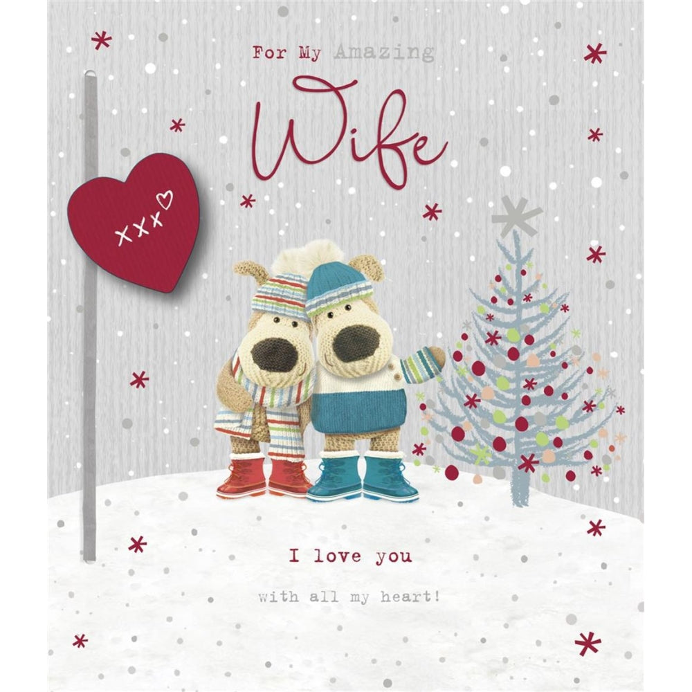 UK Greetings Boofles Christmas card featuring Boofles standing near a decorated Christmas tree, celebrating the holiday season.