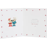 UK Greetings Christmas card featuring Boofles with presents, depicting a festive scene for Grandma and Grandad.