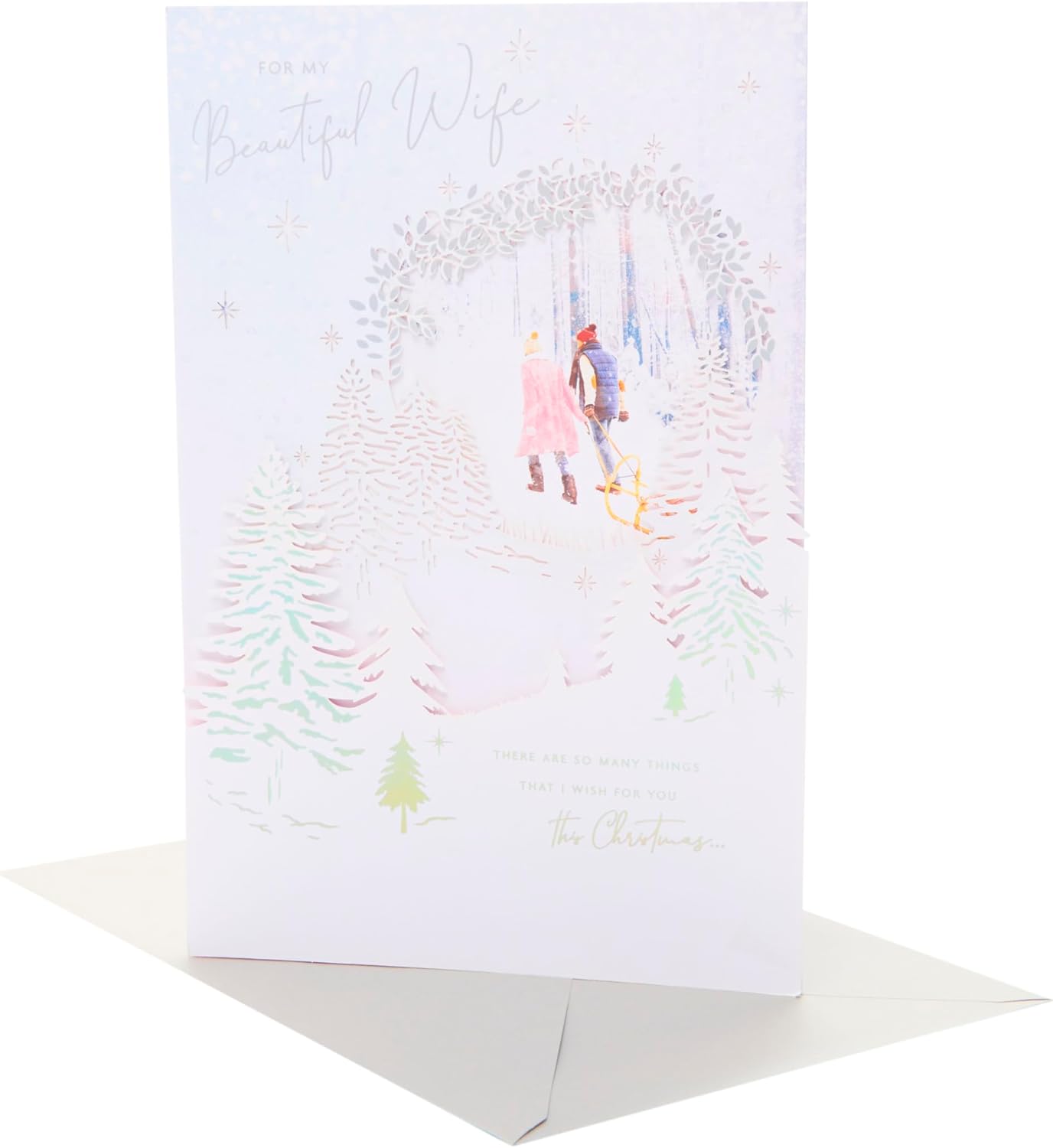 UK Greetings Christmas card for wife featuring a beautiful snow scene with festive holiday imagery