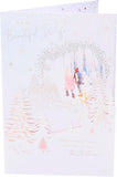 UK Greetings Christmas Card for Wife featuring a beautiful snow scene with festive holiday imagery.