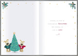 Christmas greeting card for sister and brother-in-law featuring a cute Boofle dog design, festive embellishments, UK Greetings.