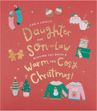 UK Greetings Christmas greeting card featuring a cozy design for daughter and son-in-law, perfect for holiday wishes.
