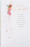 UK Greetings Christmas greeting card for granddaughter with festive design, featuring holiday-themed imagery and heartfelt message.