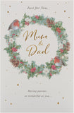 UK Greetings Christmas greeting card for Mum and Dad with a festive wreath design, featuring holiday-themed artwork.