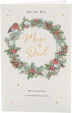 UK Greetings Christmas greeting card for Mum and Dad featuring a festive wreath design and holiday-themed artwork.