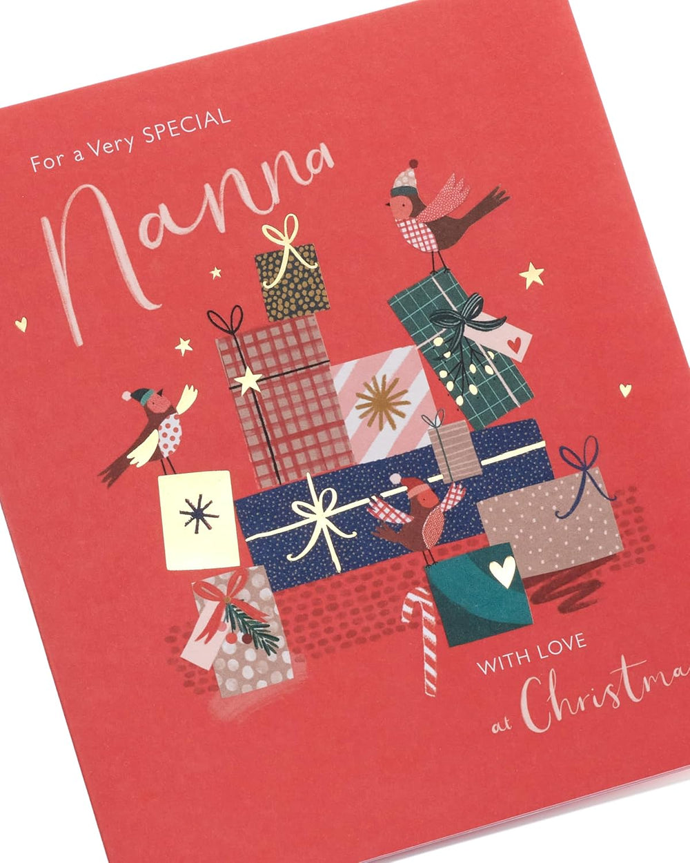 UK Greetings Christmas greeting card for Nanna featuring presents and festive design, perfect for holiday wishes.