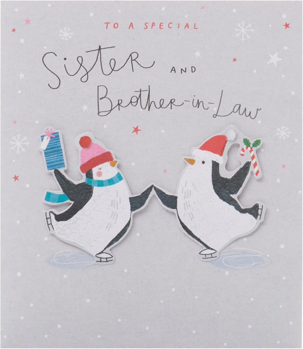 UK Greetings Christmas greeting card featuring adorable penguins ice skating, designed for sister and brother-in-law.