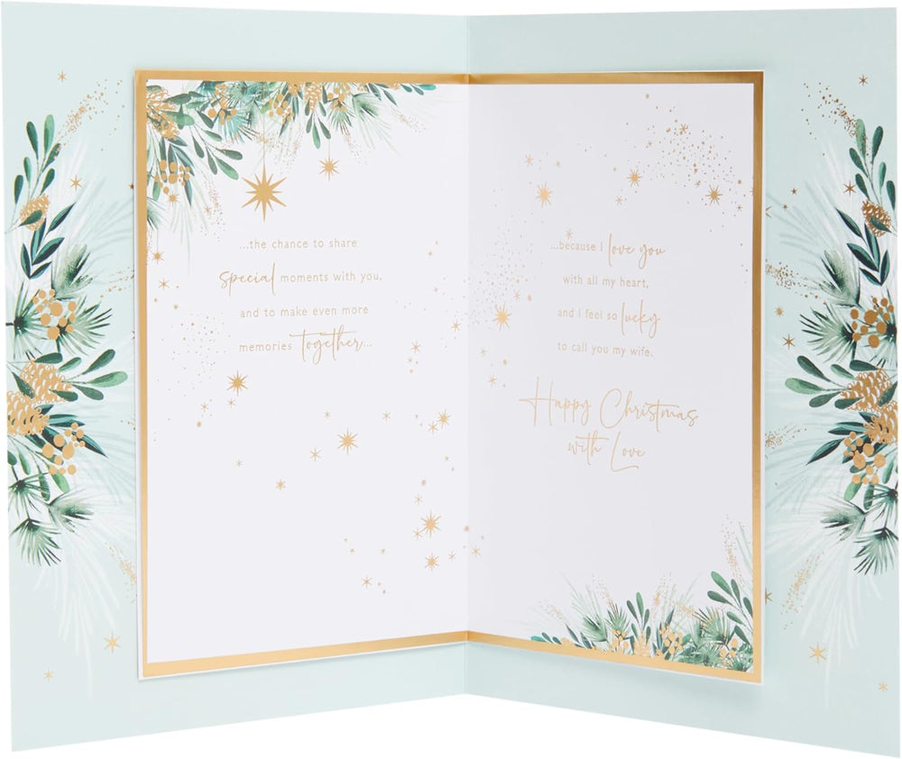 UK Greetings Christmas greeting card for wife featuring an elegant festive gold design with holiday-themed decorations.