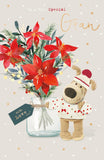 UK Greetings Christmas greeting card for Gran featuring a cute Boofle design with poinsettia blooms and festive holiday imagery.