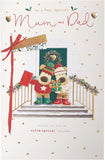 UK Greetings Christmas greeting card featuring a cute Boofle dog design, perfect for special Mum and Dad holiday wishes.
