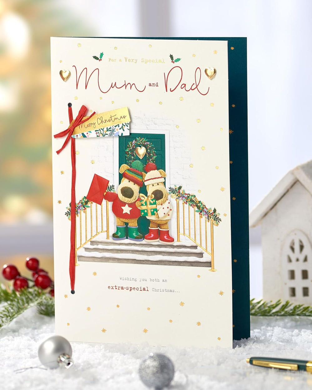 UK Greetings Christmas greeting card for mum and dad featuring a cute Boofle dog design with festive embellishments.