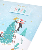 UK Greetings Christmas greeting card for grandmother featuring a festive multi-caption design and holiday-themed illustrations.
