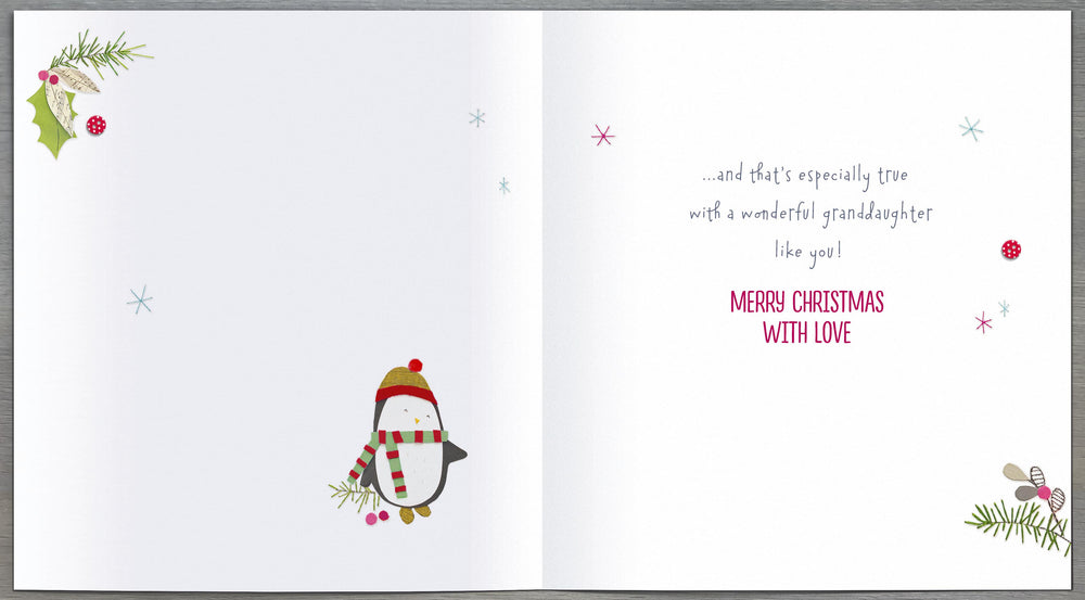UK Greetings Christmas greeting card featuring a cute penguin and present for a special granddaughter, festive holiday design.