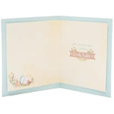 UK Greetings Easter Card for a Special Couple featuring a floral eggs design, with colorful floral and egg illustrations.