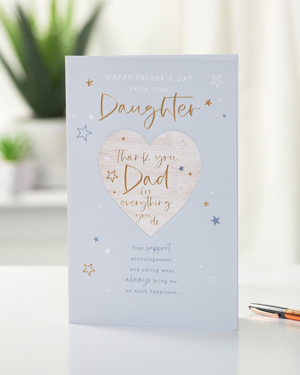 UK Greetings Father's Day card from daughter with thank you design, featuring heartfelt message and decorative floral accents.
