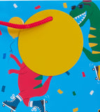 Large UK Greetings gift bag featuring colorful dinosaur design, ideal for party presents and gift-giving occasions.