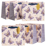 Pink, purple, and gold large UK Greetings butterfly gift bag with floral design and sturdy handles.