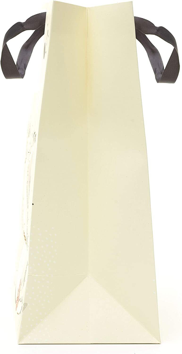 Large UK Greetings cocktail design gift bag with colorful printed cocktail illustrations for special occasions.