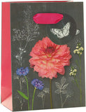 UK Greetings floral design birthday gift bag with small handles, perfect for presenting small birthday presents.