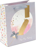 UK Greetings gift bag for presents featuring floral and heart designs, ideal for bridesmaids and special occasions.
