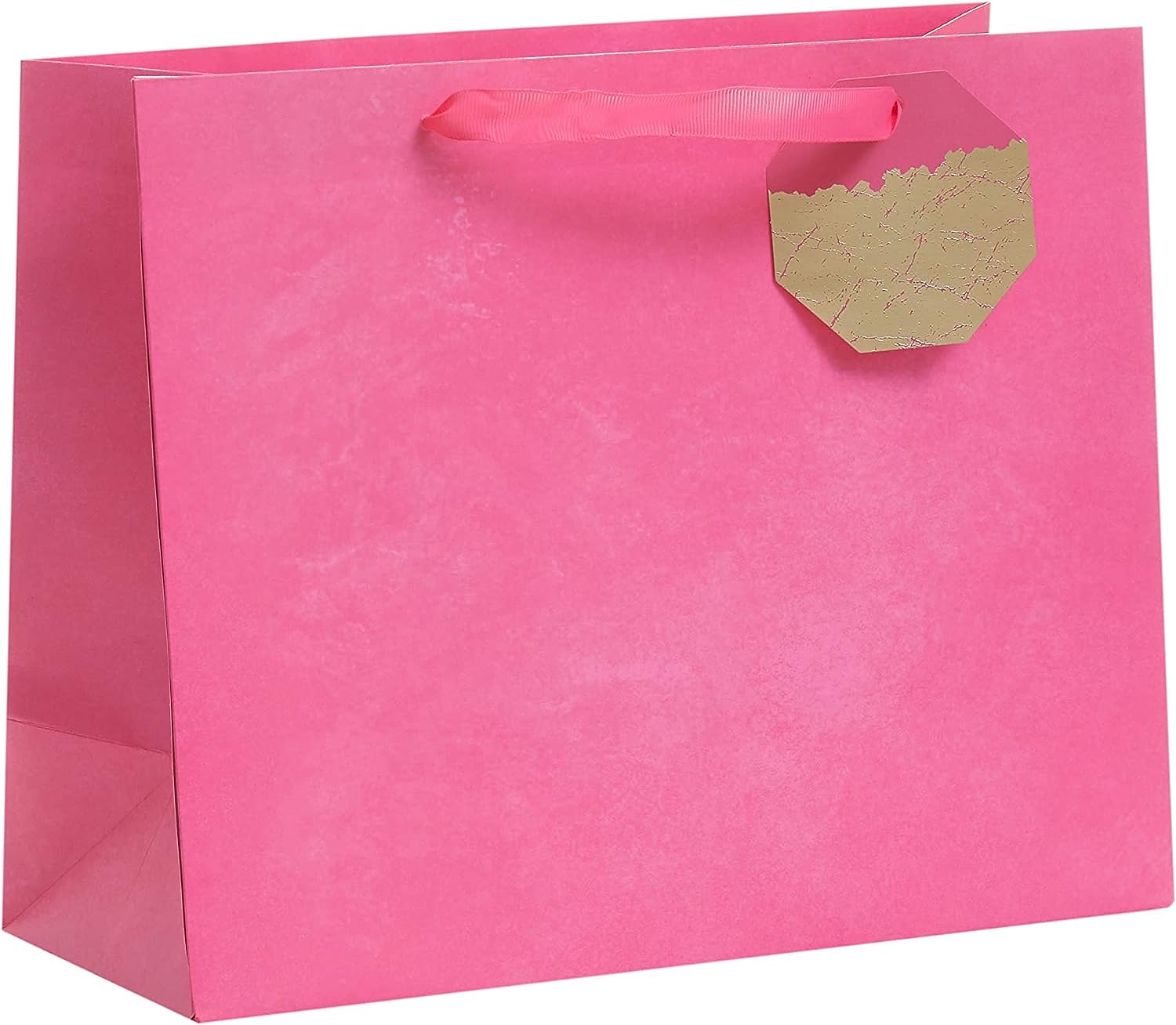 Bright pink UK Greetings large gift bag with handles, perfect for wrapping special presents or party favors.