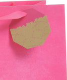 Bright pink UK Greetings large gift bag with handles, perfect for gift-giving and special occasions.