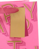 Pink UK Greetings medium gift bag for her, featuring a stylish female design, ideal for special occasions and gift presentation.