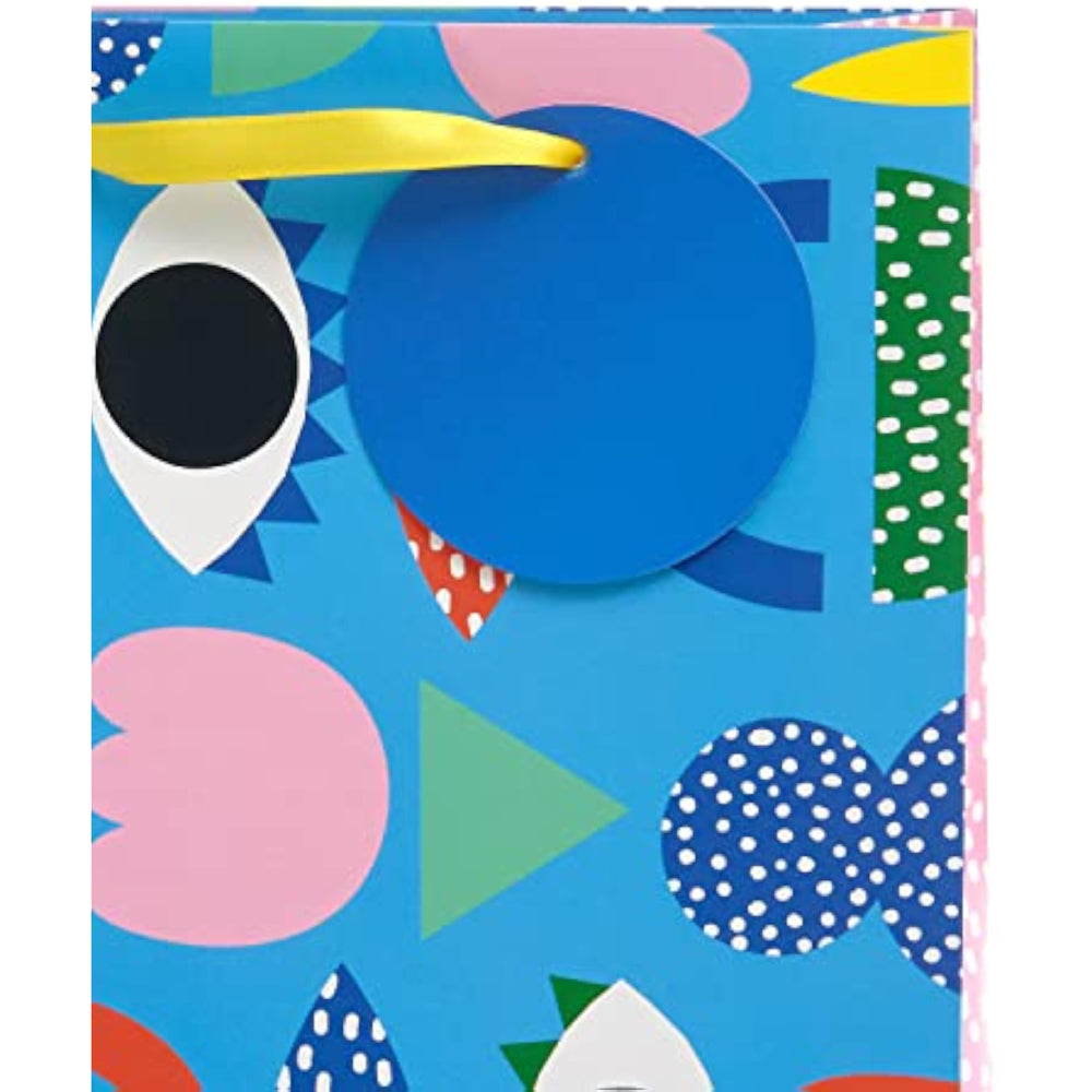 UK Greetings medium gift bag for her or friend featuring a colorful pop art design, perfect for gifting occasions.
